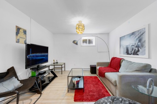Salle familiale - 777 Rue Des Plaines, Saint-Eustache, QC - Indoor Photo Showing Living Room