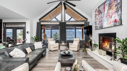 2328 Arthur Court, Kelowna, BC - Indoor Photo Showing Living Room With Fireplace