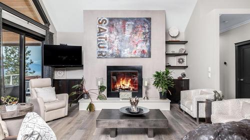 2328 Arthur Court, Kelowna, BC - Indoor Photo Showing Living Room With Fireplace