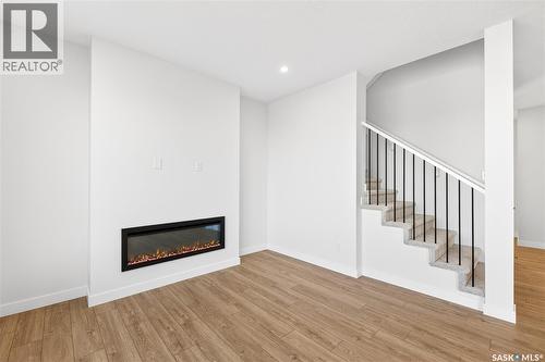 283 Nazarali Way, Saskatoon, SK - Indoor With Fireplace