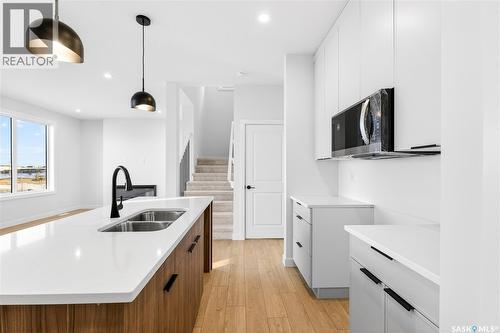 283 Nazarali Way, Saskatoon, SK - Indoor Photo Showing Kitchen With Double Sink