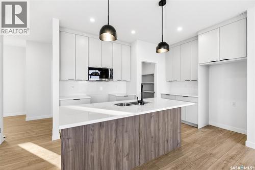 283 Nazarali Way, Saskatoon, SK - Indoor Photo Showing Kitchen With Double Sink
