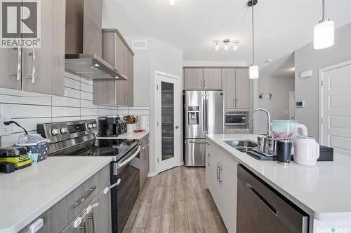 394 Hassard Close, Saskatoon, SK - Indoor Photo Showing Kitchen With Stainless Steel Kitchen With Upgraded Kitchen