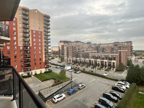 Vue d'ensemble - 603-3330 Boul. Le Carrefour, Laval (Chomedey), QC - Outdoor With Balcony