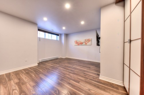 Salle familiale - 404 Av. Mousseau-Vermette, Dorval, QC - Indoor Photo Showing Other Room