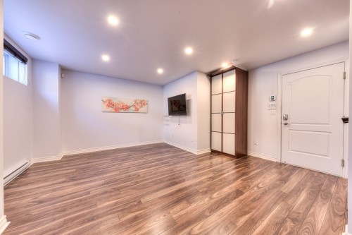 Salle familiale - 404 Av. Mousseau-Vermette, Dorval, QC - Indoor Photo Showing Other Room