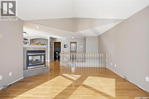 9 Pelican Pass, Thode, SK - Indoor Photo Showing Other Room With Fireplace