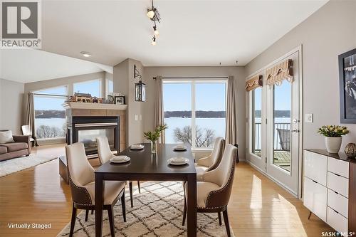 9 Pelican Pass, Thode, SK - Indoor Photo Showing Dining Room With Fireplace