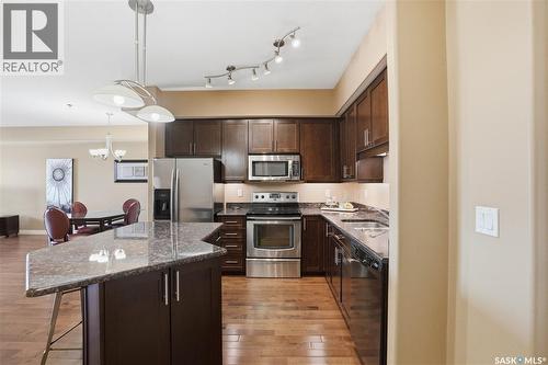 311 227 Pinehouse Drive, Saskatoon, SK - Indoor Photo Showing Kitchen With Upgraded Kitchen