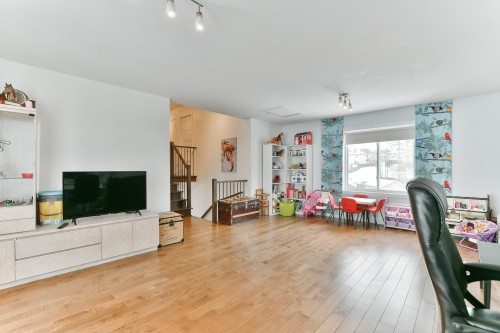 Salle familiale - 2592 Rue Robindaine, L'Assomption, QC - Indoor Photo Showing Living Room