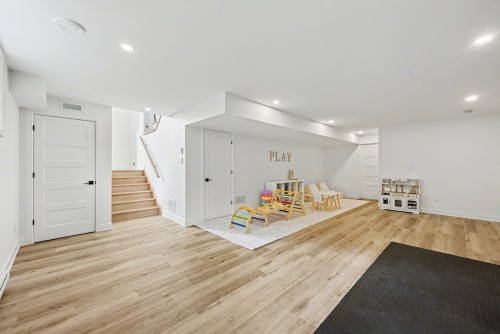 Family Room - 283 Rue De L'Aigle, Carignan, QC - Indoor Photo Showing Gym Room