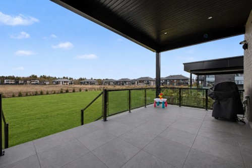 Back of Structure - 283 Rue De L'Aigle, Carignan, QC - Outdoor With Deck Patio Veranda