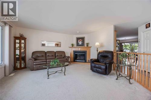 5700 Blackwell Sideroad Unit# 143, Sarnia, ON - Indoor Photo Showing Living Room With Fireplace