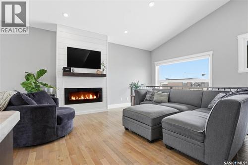 504 Snead Lane, Warman, SK - Indoor Photo Showing Living Room With Fireplace