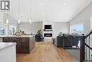 504 Snead Lane, Warman, SK  - Indoor Photo Showing Kitchen With Fireplace With Double Sink 