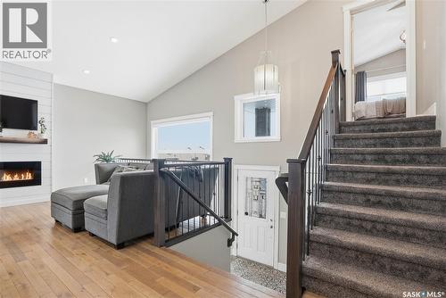 504 Snead Lane, Warman, SK - Indoor With Fireplace