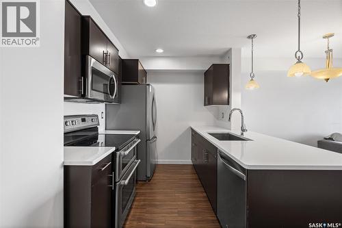 1414 5500 Mitchinson Way, Regina, SK - Indoor Photo Showing Kitchen With Stainless Steel Kitchen With Upgraded Kitchen