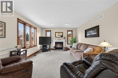60 Highland Boulevard, Caledonia, ON - Indoor Photo Showing Living Room With Fireplace