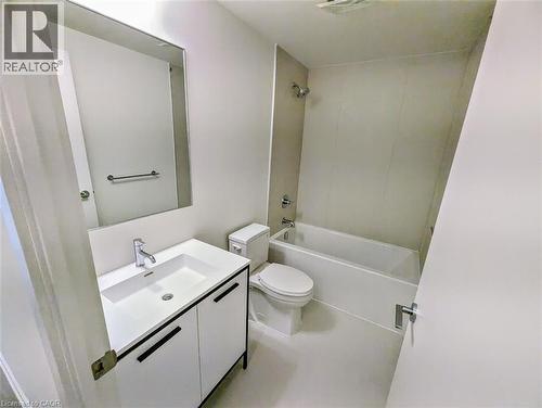 Full bathroom with vanity and washtub / shower combination - 385 Winston Road Unit# 1311, Grimsby, ON - Indoor Photo Showing Bathroom