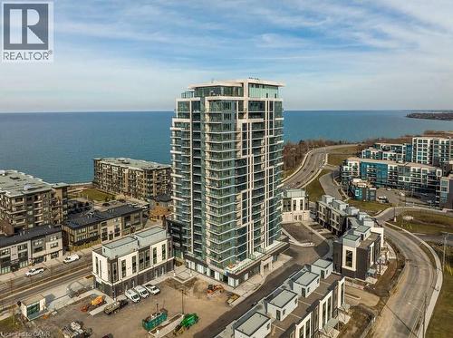 View of urban area with a large body of water - 385 Winston Road Unit# 1311, Grimsby, ON - Outdoor With Body Of Water With View