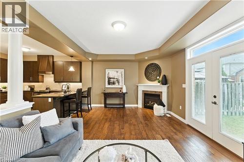 100 Fall Fair Way, Binbrook, ON - Indoor Photo Showing Living Room With Fireplace
