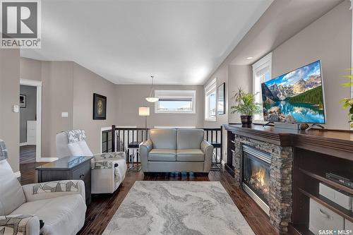 5117 Watson Way, Regina, SK - Indoor Photo Showing Living Room With Fireplace
