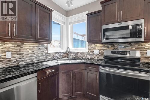 5117 Watson Way, Regina, SK - Indoor Photo Showing Kitchen With Upgraded Kitchen