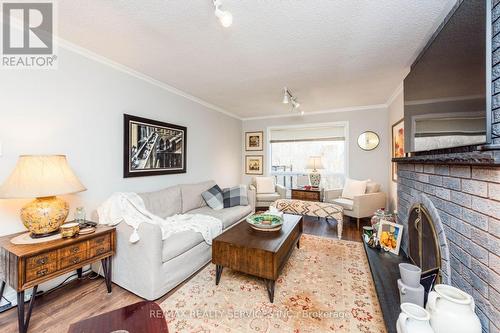1928 Aldermead Road, Mississauga, ON - Indoor Photo Showing Living Room With Fireplace