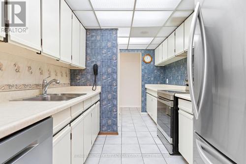 2704 - 3650 Kaneff Crescent, Mississauga, ON - Indoor Photo Showing Kitchen With Double Sink