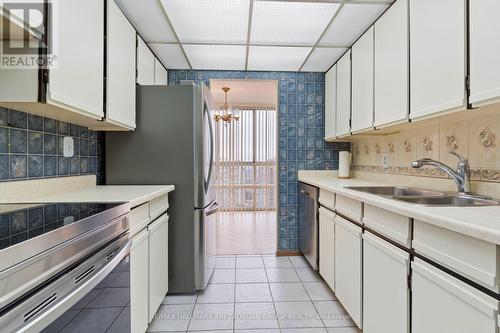 2704 - 3650 Kaneff Crescent, Mississauga, ON - Indoor Photo Showing Kitchen With Double Sink