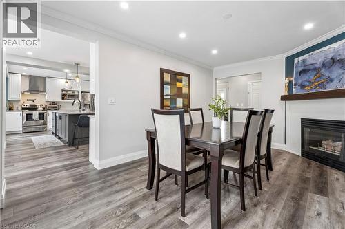 18 Marisa Court, Hamilton, ON - Indoor Photo Showing Dining Room With Fireplace