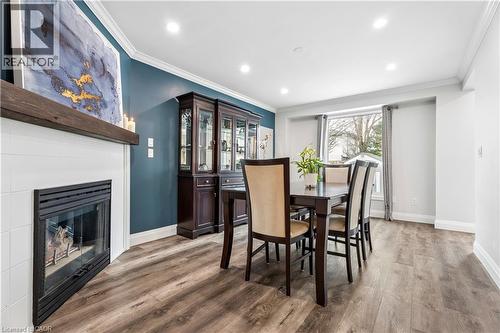 18 Marisa Court, Hamilton, ON - Indoor Photo Showing Dining Room With Fireplace