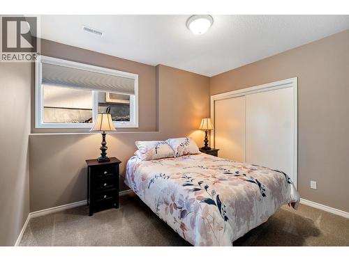 Lower level bedroom - 3907 Gallaghers Circle, Kelowna, BC - Indoor Photo Showing Bedroom