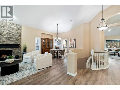 3907 Gallaghers Circle, Kelowna, BC - Indoor Photo Showing Living Room With Fireplace