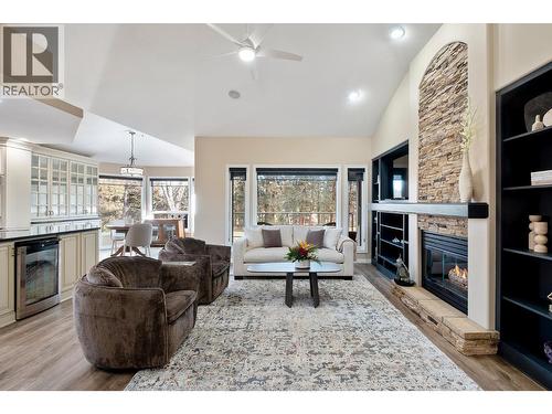 3907 Gallaghers Circle, Kelowna, BC - Indoor Photo Showing Living Room With Fireplace