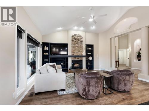 3907 Gallaghers Circle, Kelowna, BC - Indoor Photo Showing Living Room With Fireplace