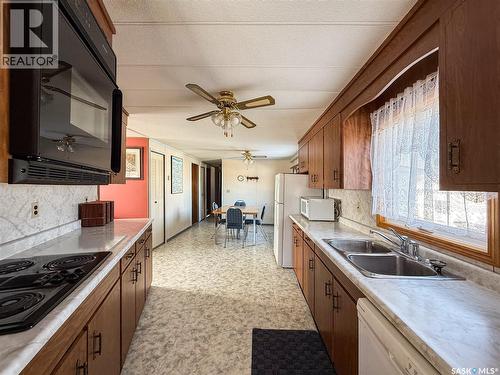 201 - 203 4Th Avenue, Climax, SK - Indoor Photo Showing Kitchen With Double Sink