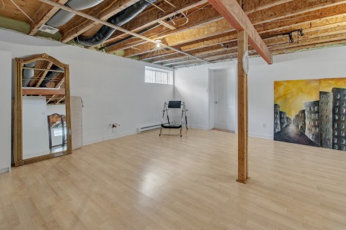 Salle familiale - 32 Rue Vanier, Blainville, QC - Indoor Photo Showing Basement