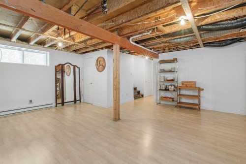 Salle familiale - 32 Rue Vanier, Blainville, QC - Indoor Photo Showing Basement