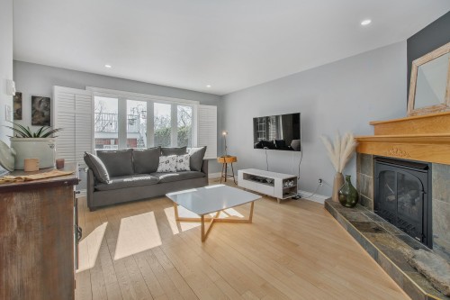 Salon - 32 Rue Vanier, Blainville, QC - Indoor Photo Showing Living Room With Fireplace