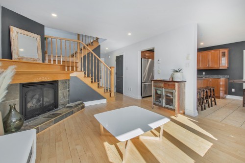 Salon - 32 Rue Vanier, Blainville, QC - Indoor Photo Showing Living Room With Fireplace