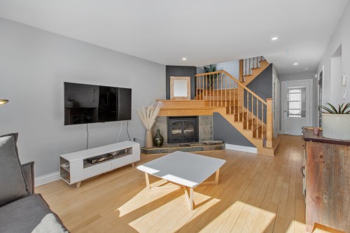 Salon - 32 Rue Vanier, Blainville, QC - Indoor Photo Showing Living Room With Fireplace