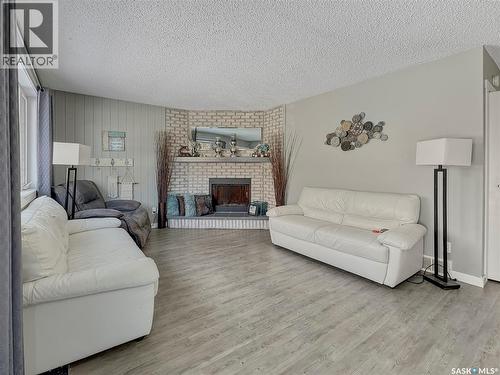 17 4Th Avenue E, Neilburg, SK - Indoor Photo Showing Living Room With Fireplace