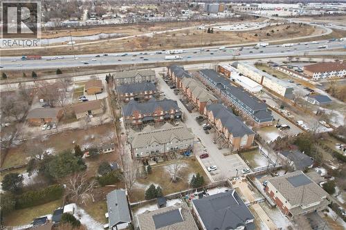 Aerial view of property's location featuring a highway and nearby suburban area - 2358 Treversh Common, Burlington, ON - Outdoor With View
