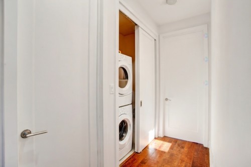 Salle de lavage - 404-1225 Boul. Robert-Bourassa, Montréal (Ville-Marie), QC - Indoor Photo Showing Laundry Room