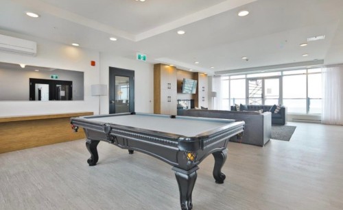 Salle communautaire - 109-8265 Rue De Londres, Brossard, QC - Indoor Photo Showing Other Room