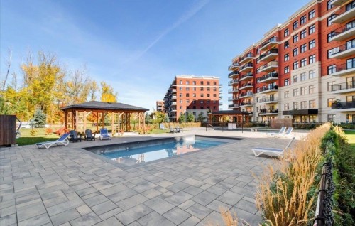 Piscine - 109-8265 Rue De Londres, Brossard, QC - Outdoor With In Ground Pool