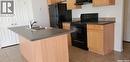 41 1275 South Railway Street E, Swift Current, SK  - Indoor Photo Showing Kitchen With Double Sink 