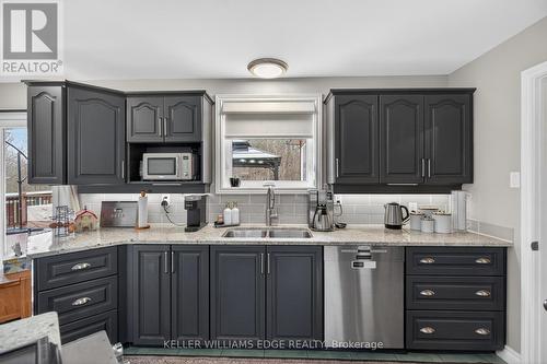 484 11Th Concession Road E, Hamilton, ON - Indoor Photo Showing Kitchen With Fireplace