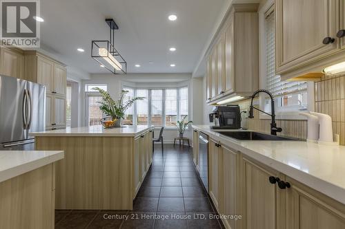 Large eat-in-kitchen - 5 Juneberry Road, Thorold (Confederation Heights), ON - Indoor Photo Showing Kitchen With Upgraded Kitchen
